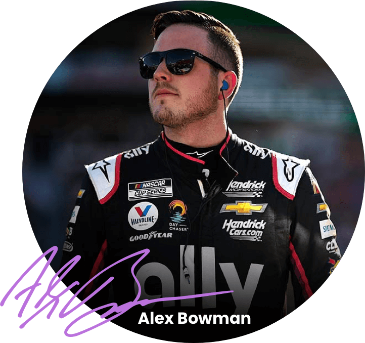 Alex Bowman, wearing sunglasses and the black Ally firesuit, stares into the distance. 