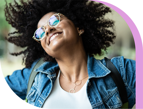 Woman dances freely outside.