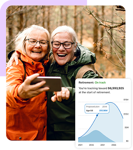 two older women posing for a photo in the woods with a widget layered on top, showing an account on track toward $6.9 million at the start of retirement, with a curved blue chart showing the account’s trajectory