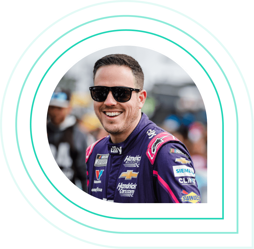 Alex Bowman, driver of Hendrick's #48 racecar smiles to fans at Daytona.