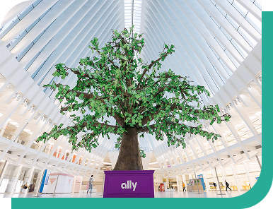 The huge Ally Money tree sculpture, with dollar bills for leaves, in an atrium at One World Trade Center in New York City.
