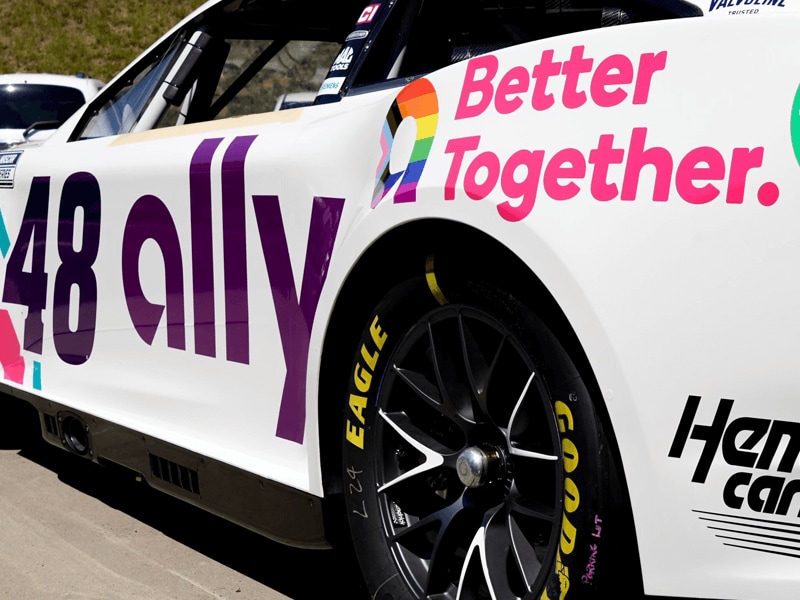 A view of the rear tire of the Ally 48 featuring a rainbow-colored “A” and the text “Better together.”
