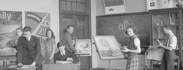 Black and white photo of men and women wearing 1920s fashion working on old time print ads, with modern Ally logos superimposed onto the ads