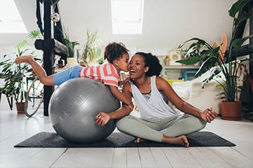 Mother and daughter exercise together