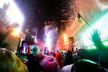 Crowd of people celebrating in Times Square on New Years Eve