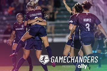 Players of the National Women’s Soccer League celebrate on field. Text overlay: Game Changers presented by Ally.